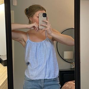 White and blue striped top from H&M in the size S.